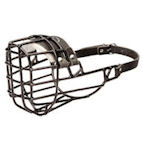 Wire dog muzzle covered by black rubber Wire dog muzzle covered by black rubber